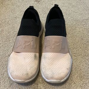 Gently used APL tennis shoes